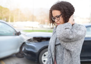 Injured woman feeling bad after having a car crash