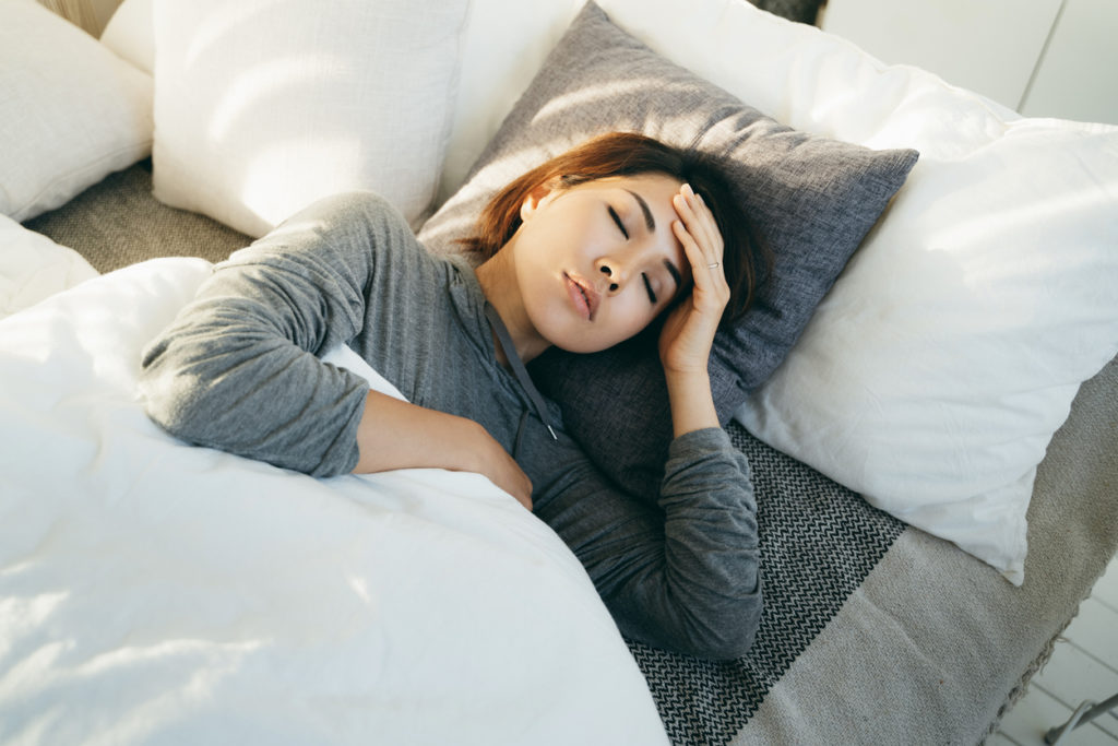 Woman with a migraine