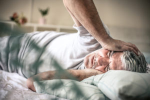 Man with migraine pain