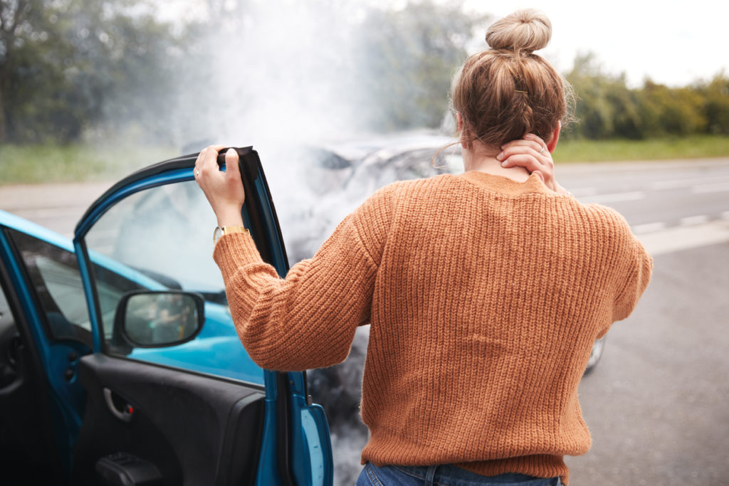 Woman with neck pain after a car accident