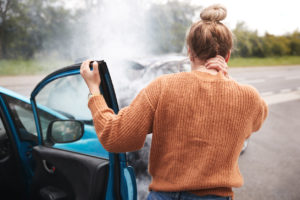 Woman with neck pain after a car accident