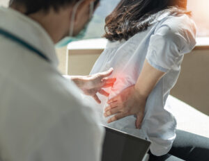 A female suffered with lower back pain